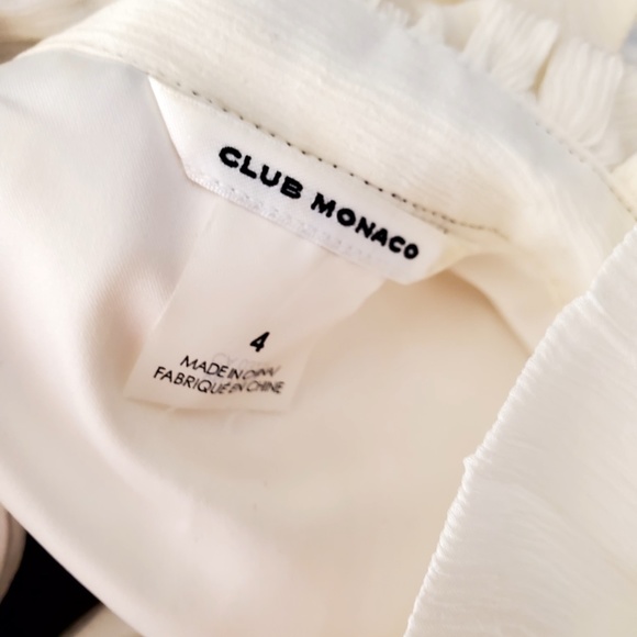 Elegant White Sleeveless Dress with Black Accents - Picture 7 of 10